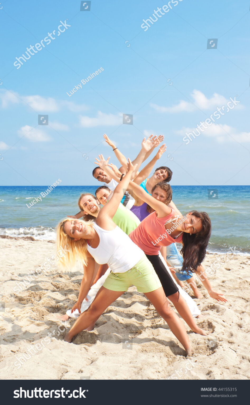 Stock Photo Group Of Young People Having Fun On The Beach 44155315 947x1536
